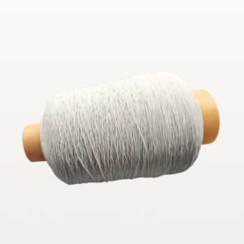 Elastyczna biała gumka introligatorska 1 mm – szpula ustawiona poziomo, widok z kąta